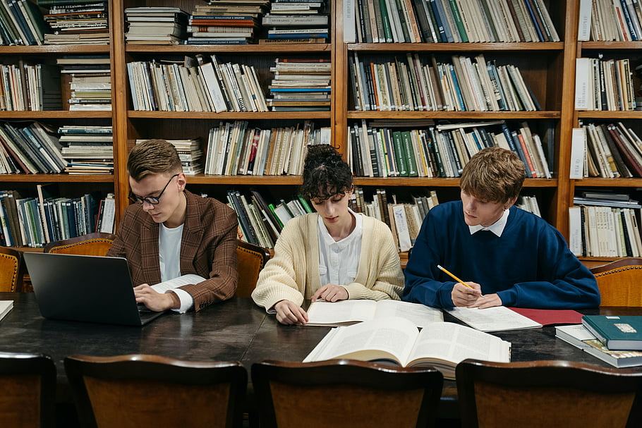 Students checking the BISE Lahore 11th class result 2026 on a laptop — online, SMS and gazette methods